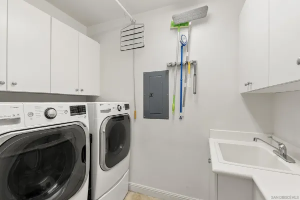 a living room with furniture and windows