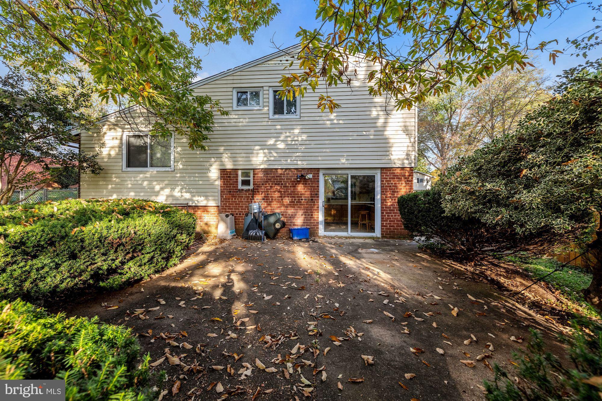 11802 Mentone Road Silver Spring, MD 20906 - Photo 22 of 31 large concrete patio perfect for relaxing