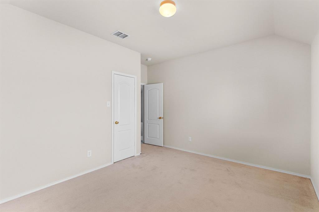2700 Hereford Road Denton, TX 76210 - Photo 28 of 36 Spacious interior with neutral carpeting and light-colored walls