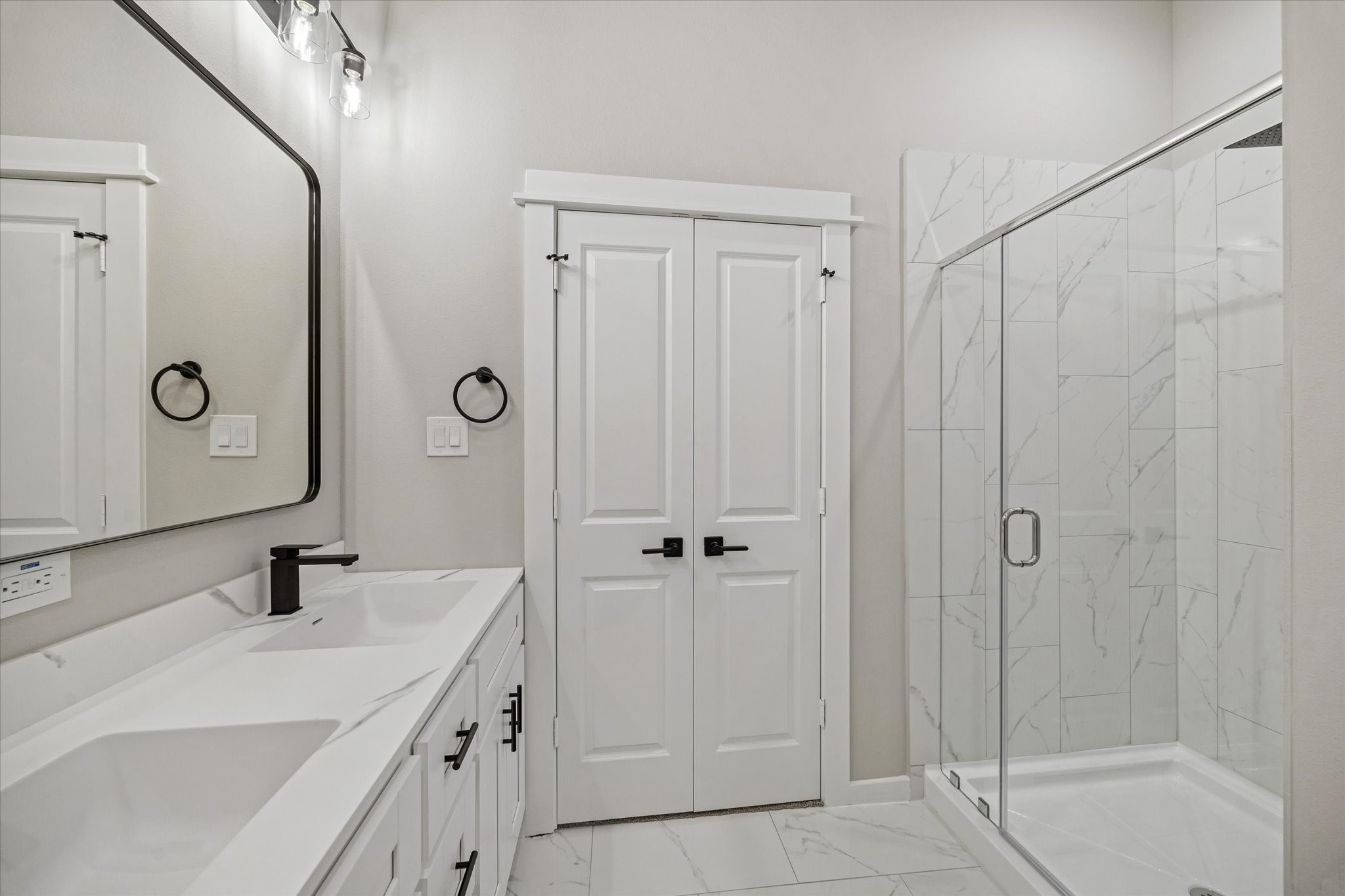 11307 Stonework Grove Lane Houston, TX 77076 - Photo 39 of 46 a bathroom with a sink and a mirror