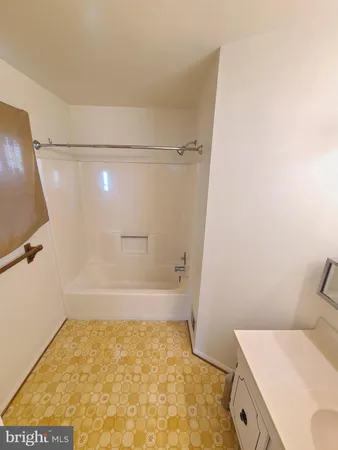 a bathroom with a sink and a vanity