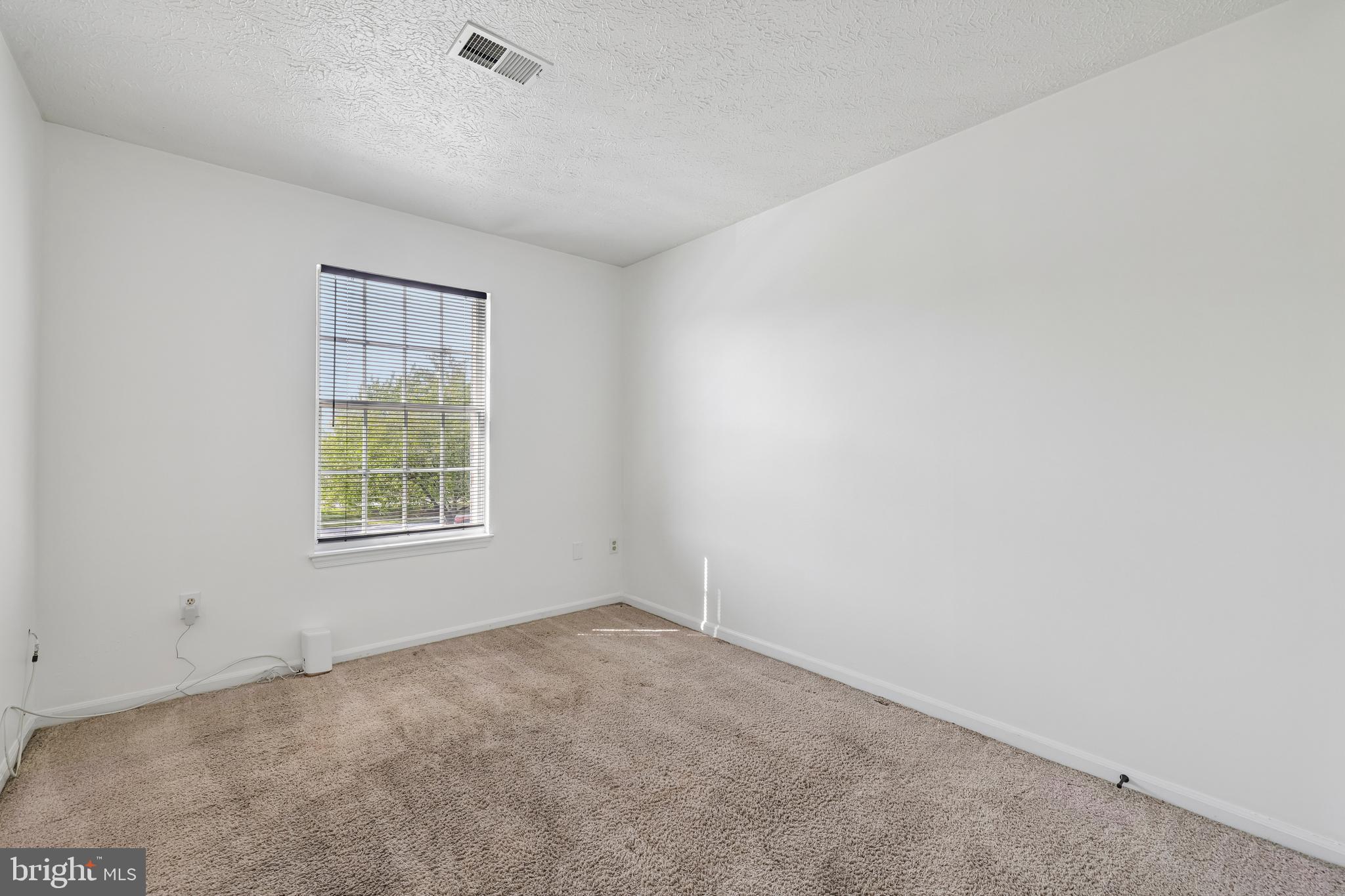 5243 Regal Court Frederick, MD 21703 - Photo 15 of 27 an empty room with a window