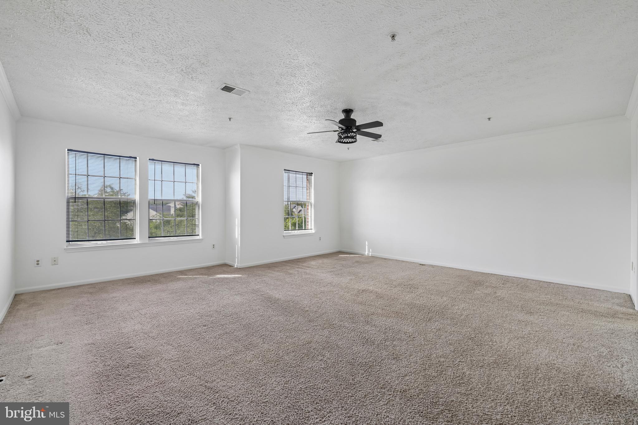 5243 Regal Court Frederick, MD 21703 - Photo 5 of 27 a view of an empty room with a window