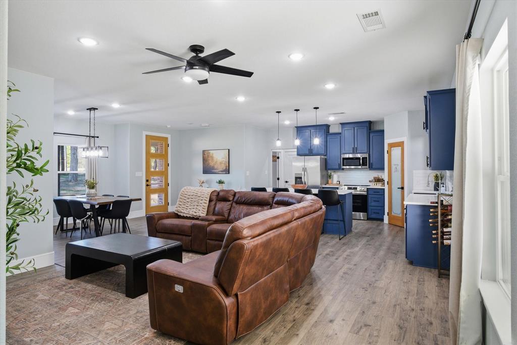 1159 Highway 276 Emory, TX 75440 - Photo 13 of 39 a living room kitchen with furniture and kitchen view