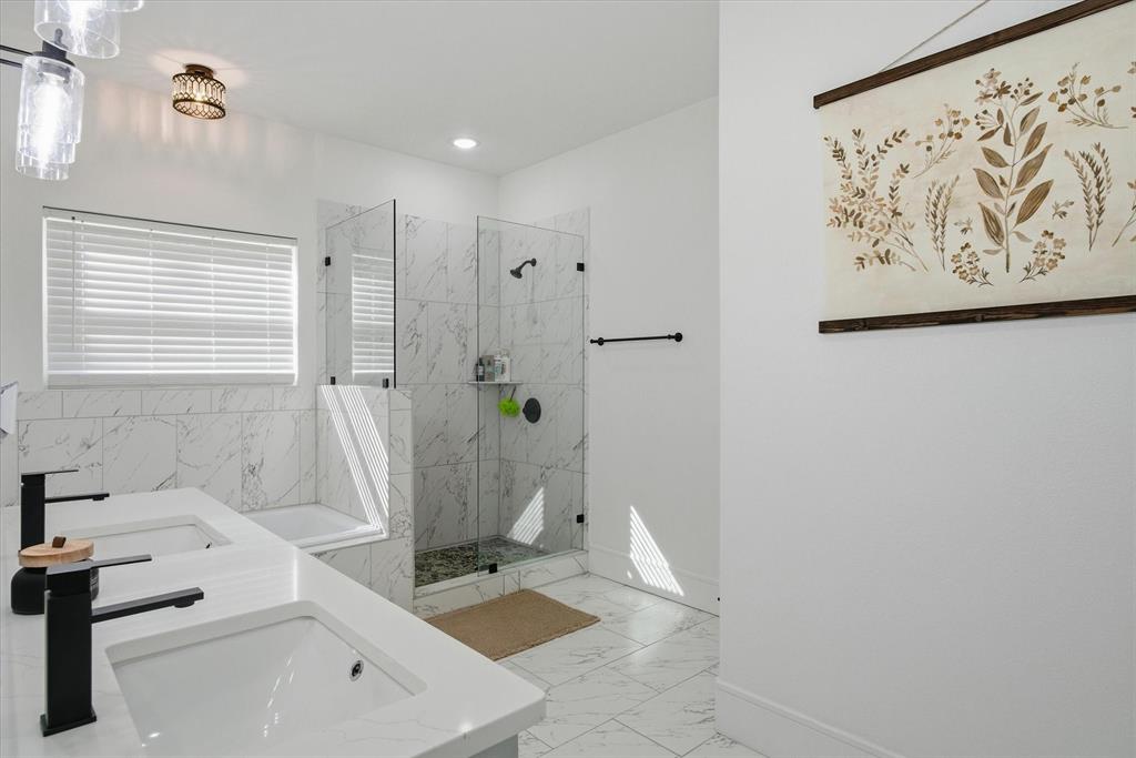 1159 Highway 276 Emory, TX 75440 - Photo 16 of 39 a bathroom with a bathtub and shower