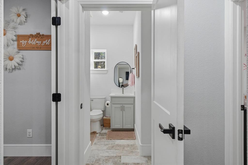 1159 Highway 276 Emory, TX 75440 - Photo 22 of 39 a bathroom with a toilet