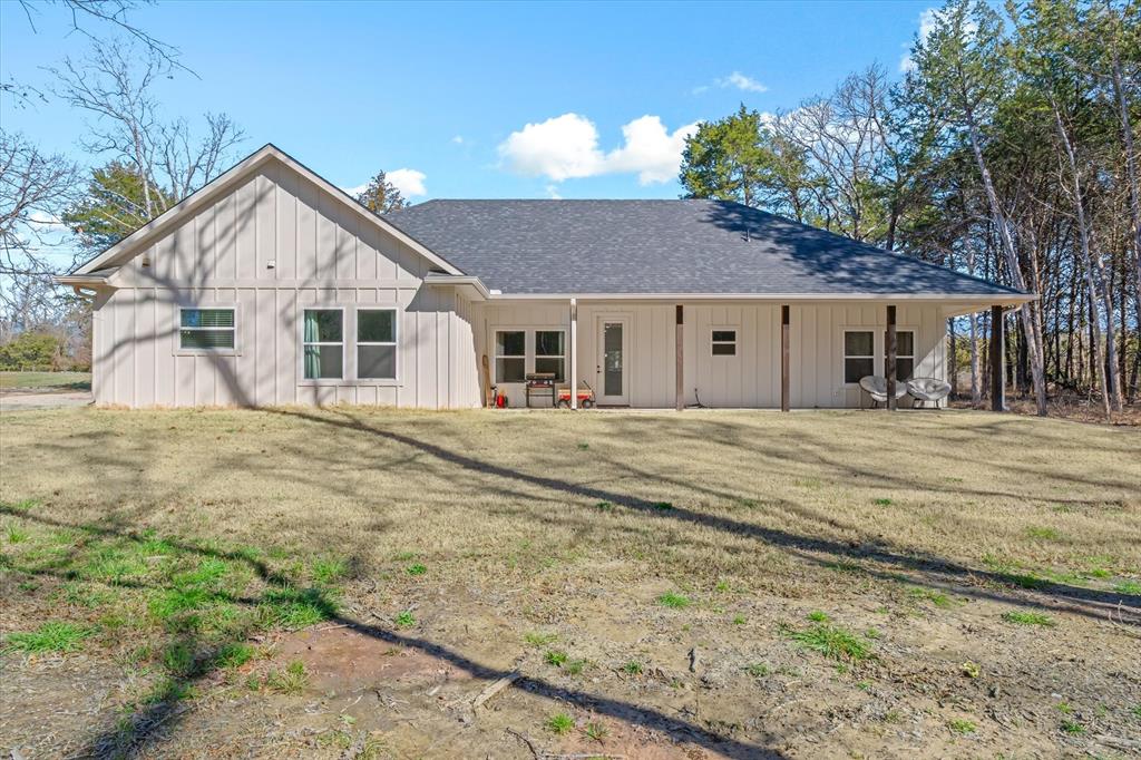 1159 Highway 276 Emory, TX 75440 - Photo 26 of 39 a view of a house with a yard