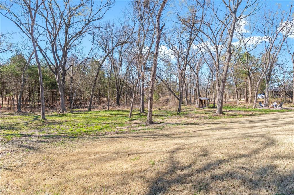1159 Highway 276 Emory, TX 75440 - Photo 29 of 39 a view of a playground with basketball court