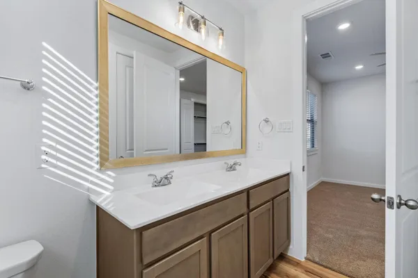 a view of a livingroom with wooden floor and closet