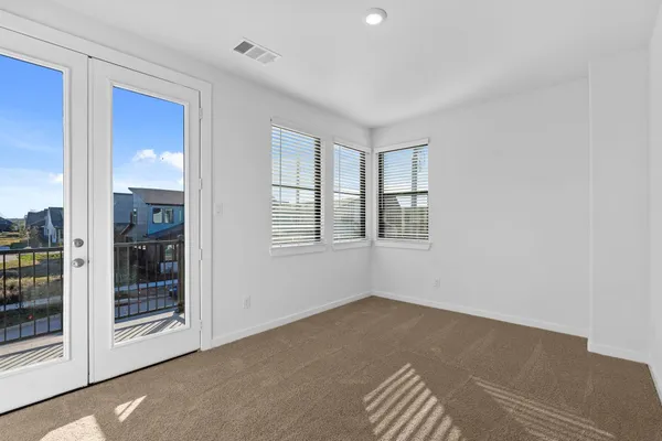 a bathroom with a bathtub and a toilet