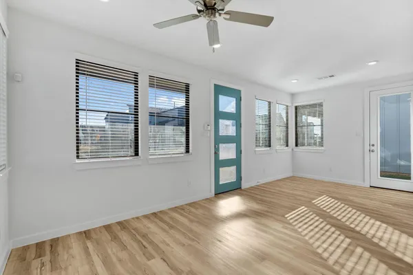 a view of large kitchen with stainless steel appliances kitchen island