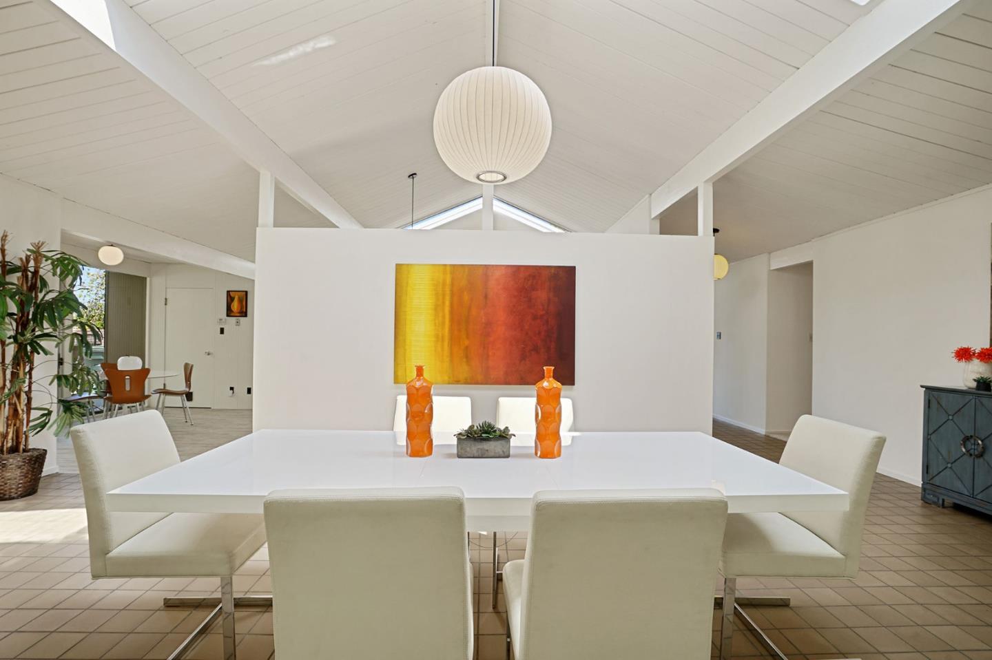 1775 Hunt Drive Burlingame, CA 94010 - Photo 15 of 37 a view of a dining room with furniture and wooden floor