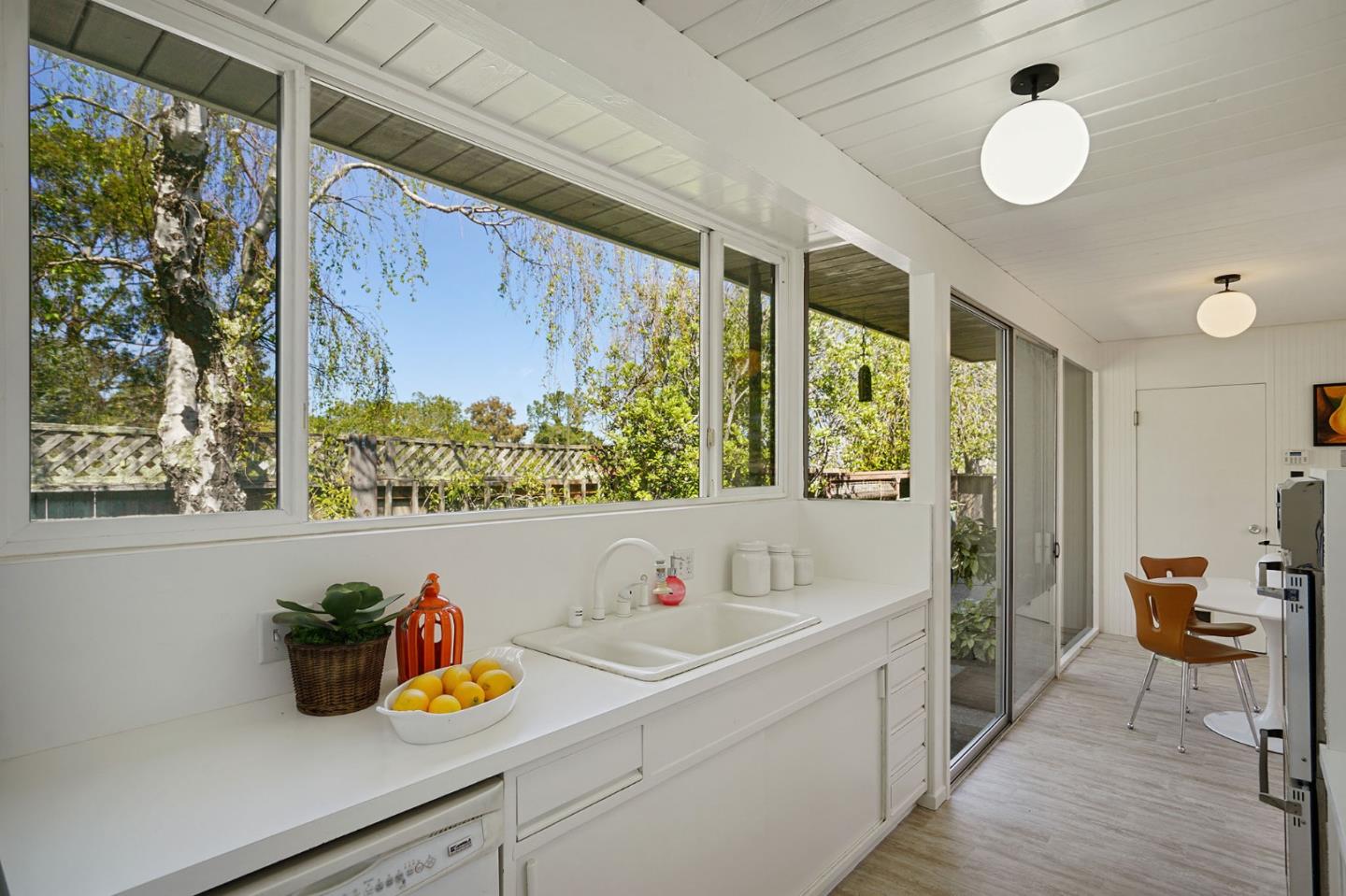1775 Hunt Drive Burlingame, CA 94010 - Photo 18 of 37 a bathroom with a sink mirror and window