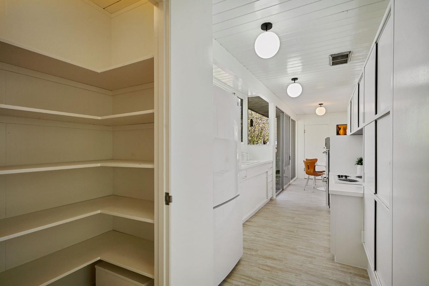 1775 Hunt Drive Burlingame, CA 94010 - Photo 21 of 37 a view of a hallway with interior of the house