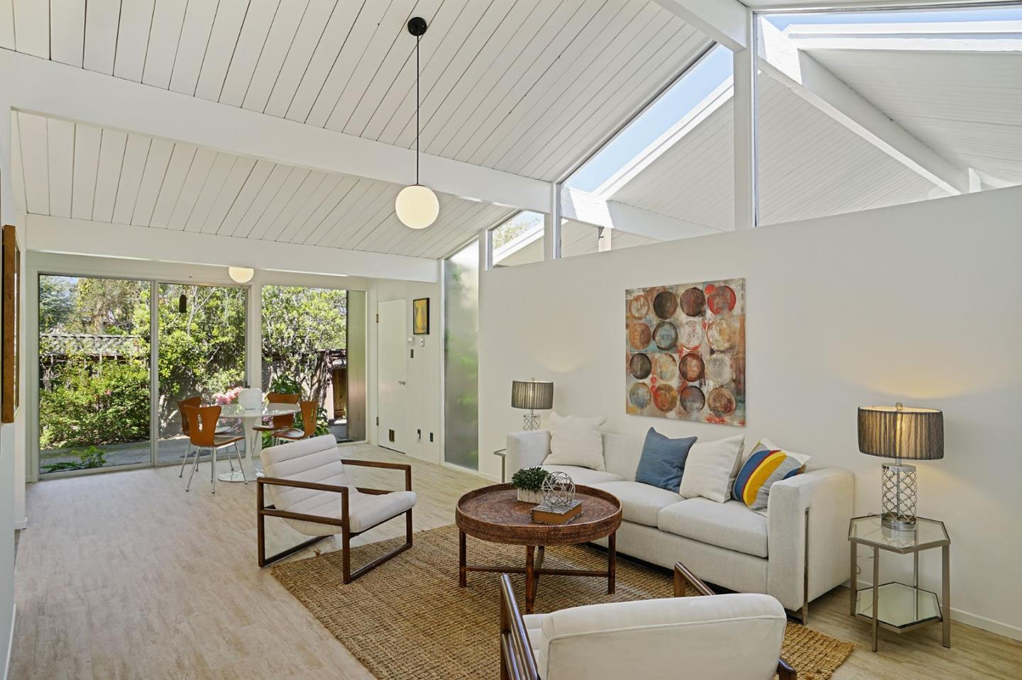 1775 Hunt Drive Burlingame, CA 94010 - Photo 22 of 37 a living room with furniture and a large window