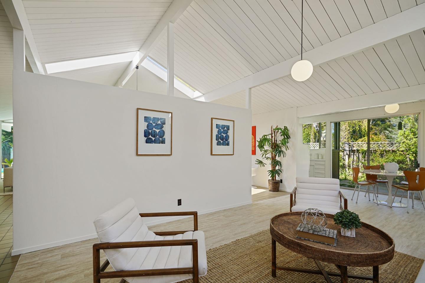1775 Hunt Drive Burlingame, CA 94010 - Photo 23 of 37 a living room with furniture and a potted plant
