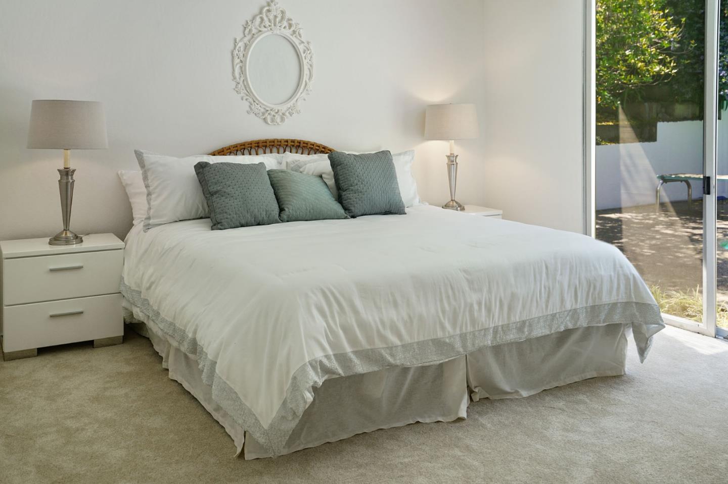 1775 Hunt Drive Burlingame, CA 94010 - Photo 25 of 37 a bedroom with a bed and window