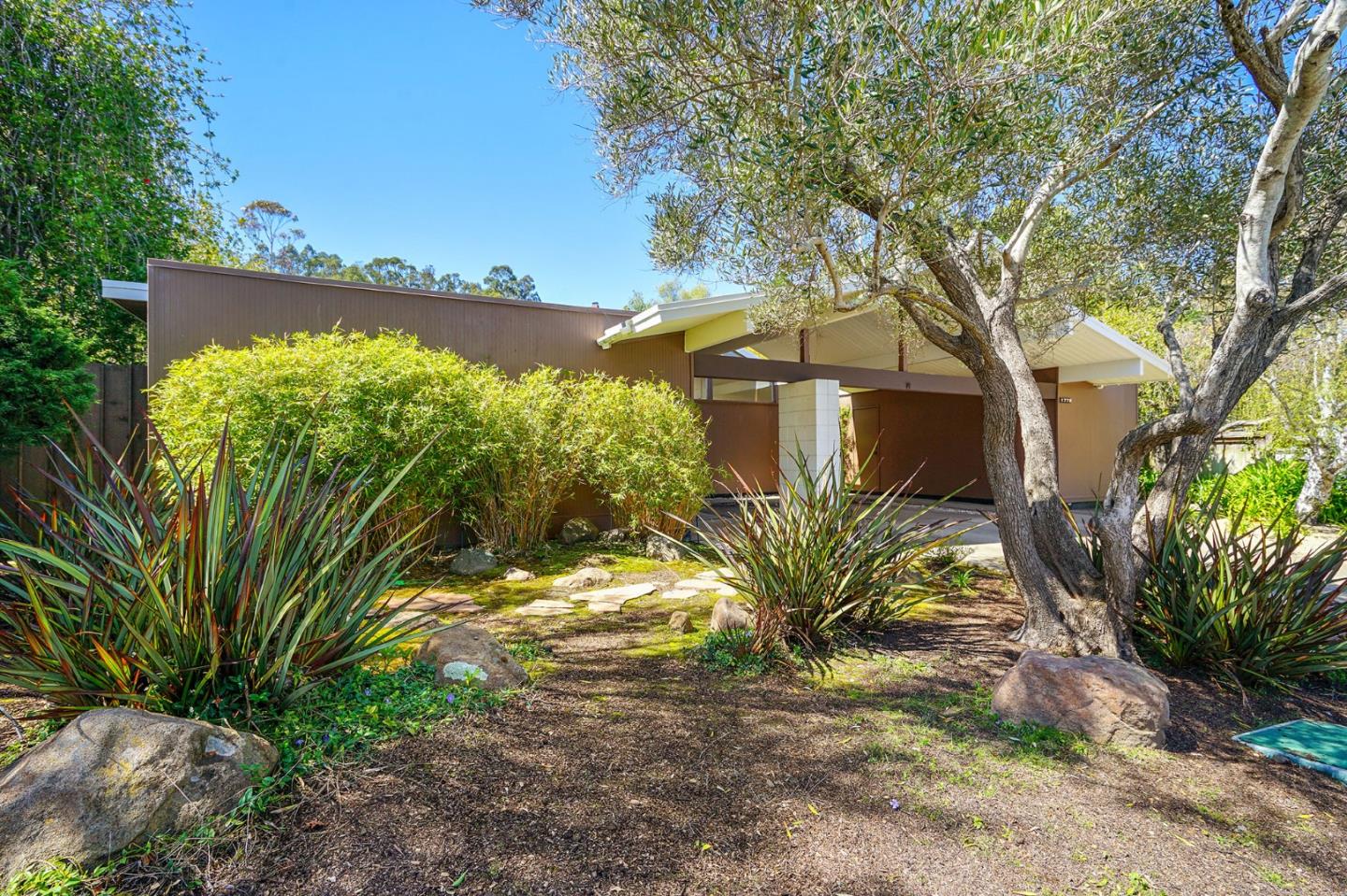 1775 Hunt Drive Burlingame, CA 94010 - Photo 3 of 37 a view of a yard with plants