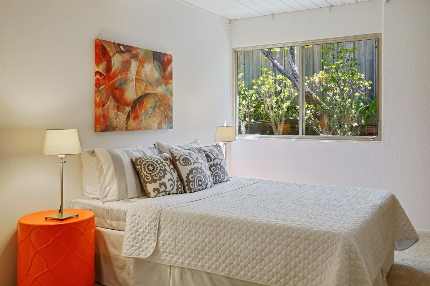 1775 Hunt Drive Burlingame, CA 94010 - Photo 31 of 37 a bedroom with a bed and a painting on the wall