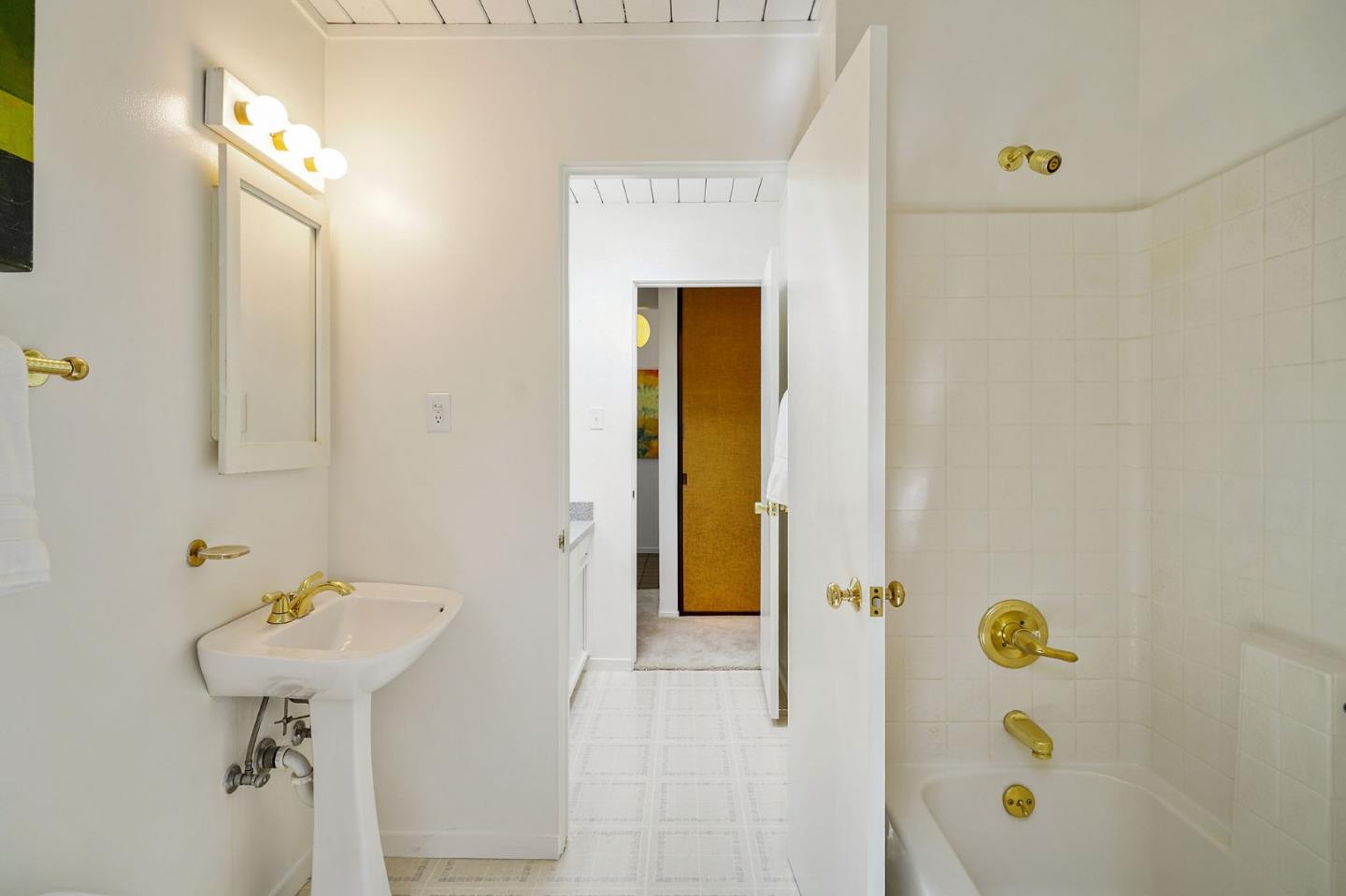 1775 Hunt Drive Burlingame, CA 94010 - Photo 34 of 37 a bathroom with a sink and a mirror