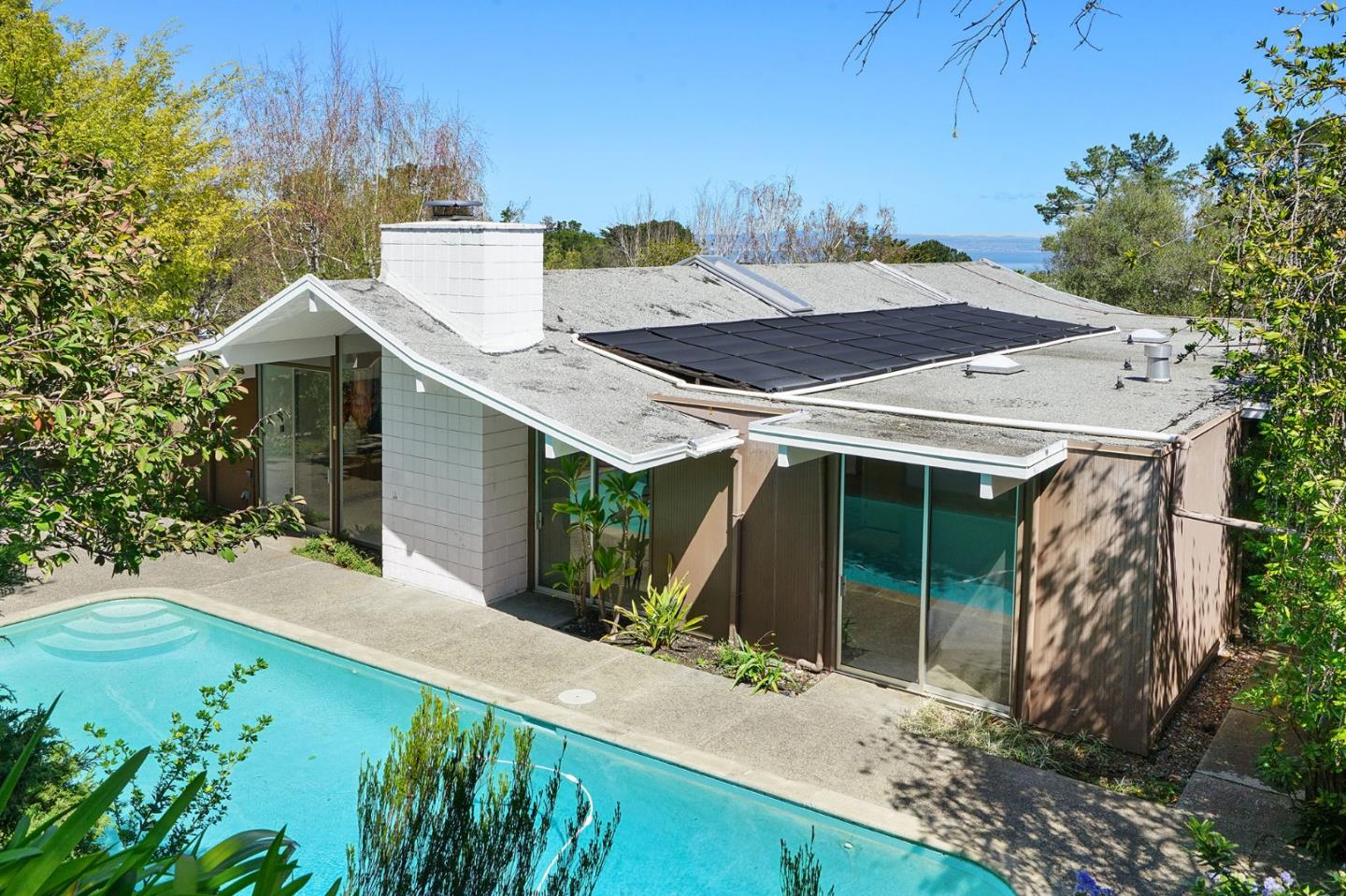 1775 Hunt Drive Burlingame, CA 94010 - Photo 5 of 37 a view of a house with backyard and garden