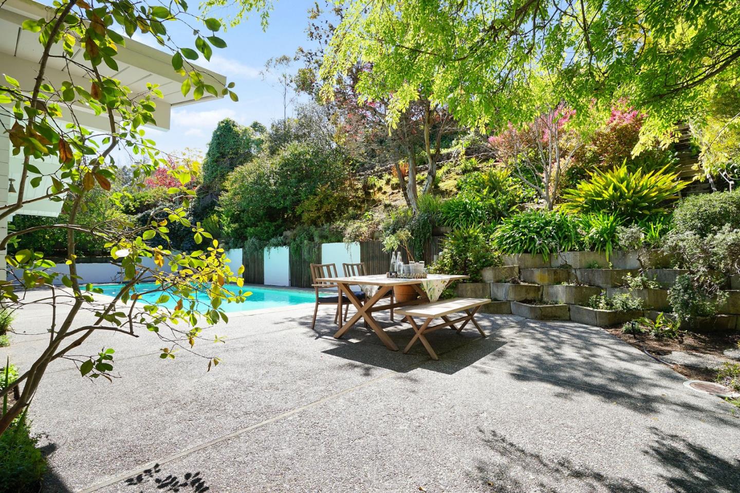 1775 Hunt Drive Burlingame, CA 94010 - Photo 7 of 37 a bench is sitting in the middle of a yard
