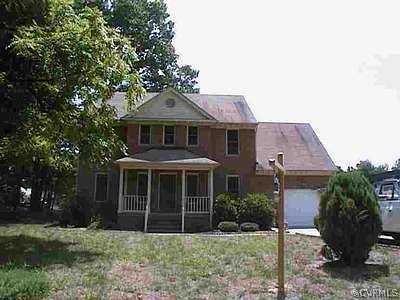4003 Kings Gate Road Chester, VA 23831 - Photo 1 of 1 a front view of a house with garden