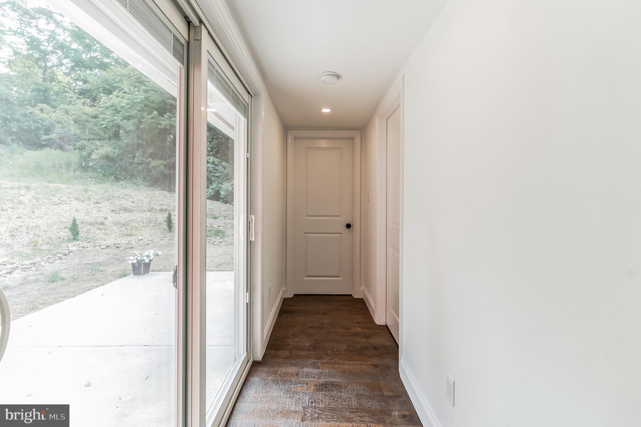 71 Concord Road Garnet Valley, PA 19060 - Photo 20 of 32 Second floor hall leading to private patio