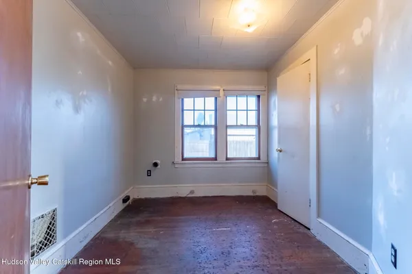 an empty room with a window