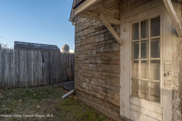 a view of outdoor space and wooden door