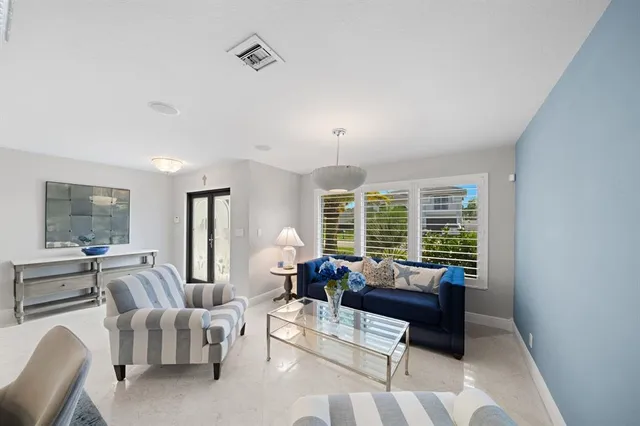 a room with gym equipment and a flat screen tv