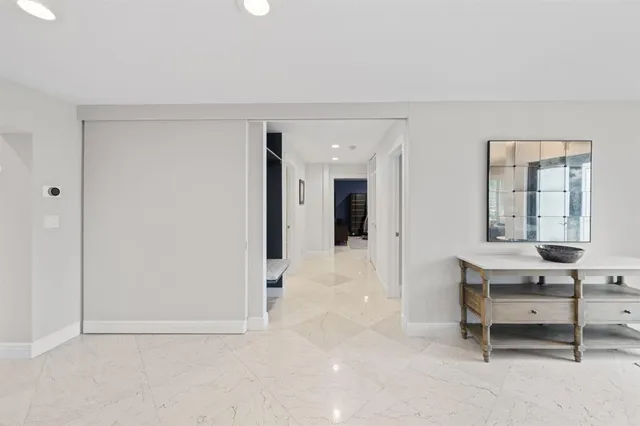 an aerial view of a house with a yard and garden