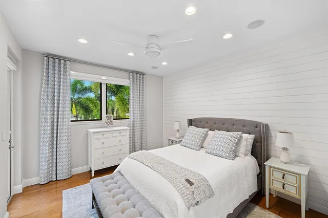 a front view of a house with a yard and a garage