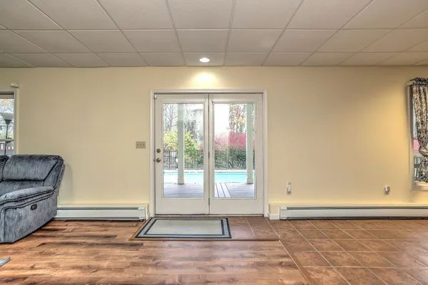 a living room with furniture and a rug