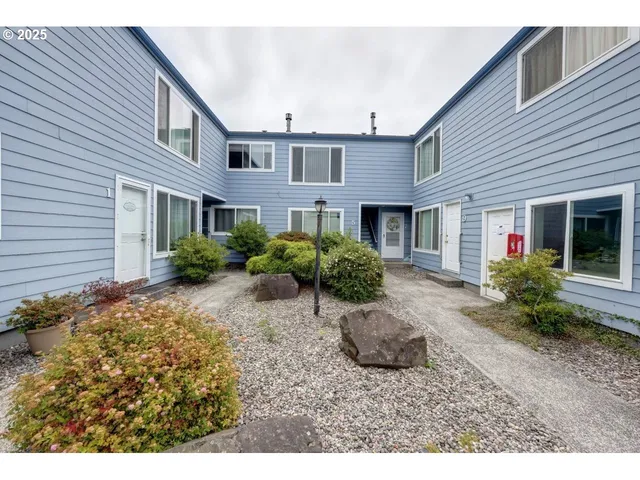 a view of a house with a garden