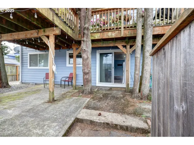 a blue house with a outdoor space