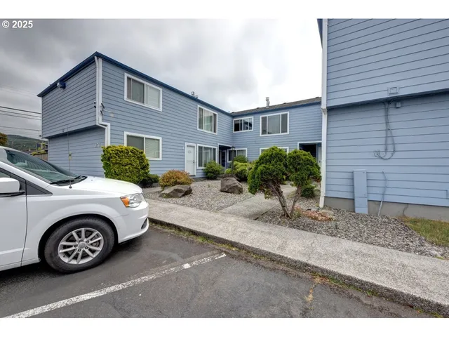 a car parked in front of a house