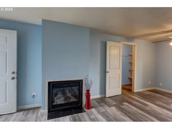 a living room with a fireplace