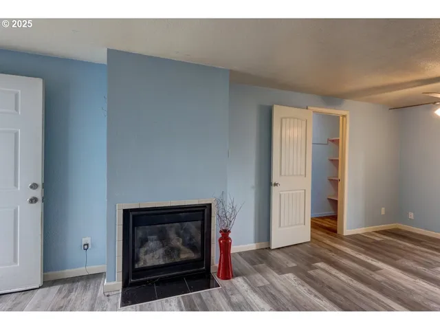 a living room with a fireplace