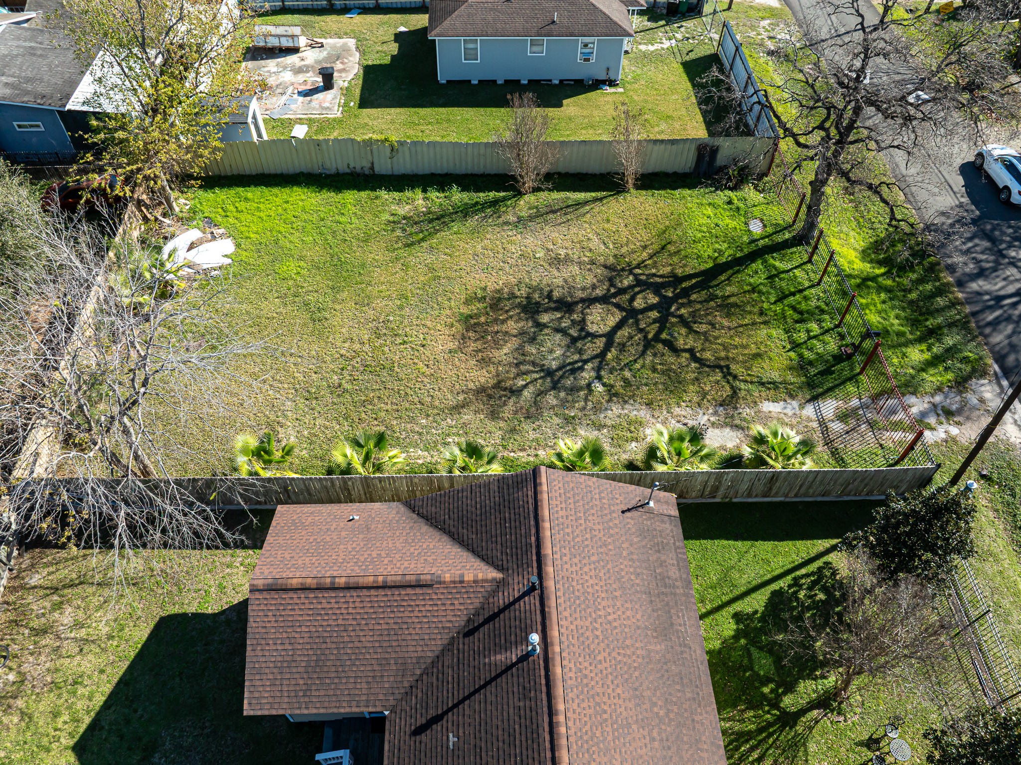 206 Oddo Street Houston, TX 77022 - Photo 8 of 18 a view of a lake with a yard