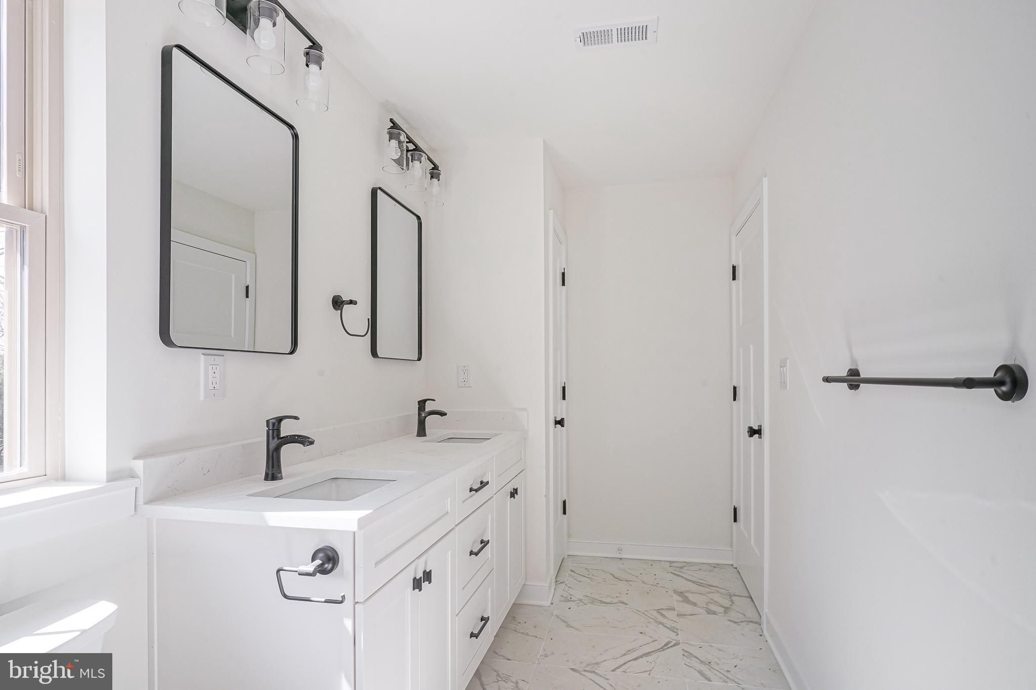 35 West Cohawkin Road Clarksboro, NJ 08020 - Photo 23 of 30 a bathroom with a double vanity sink mirror and