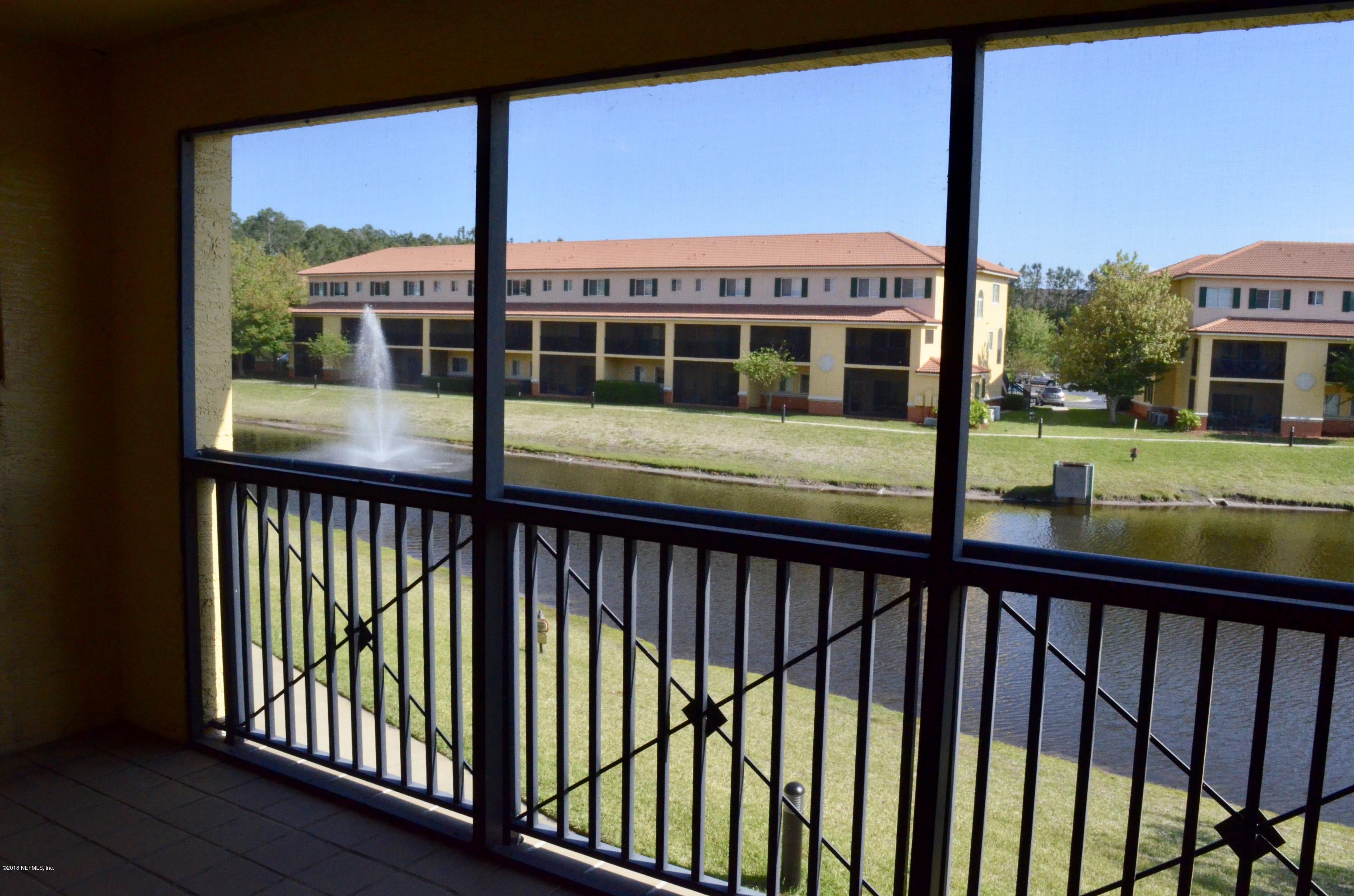 9745 Touchton Road, Unit 1821 Jacksonville, FL 32246 - Photo 11 of 33 a view of a large building from a balcony