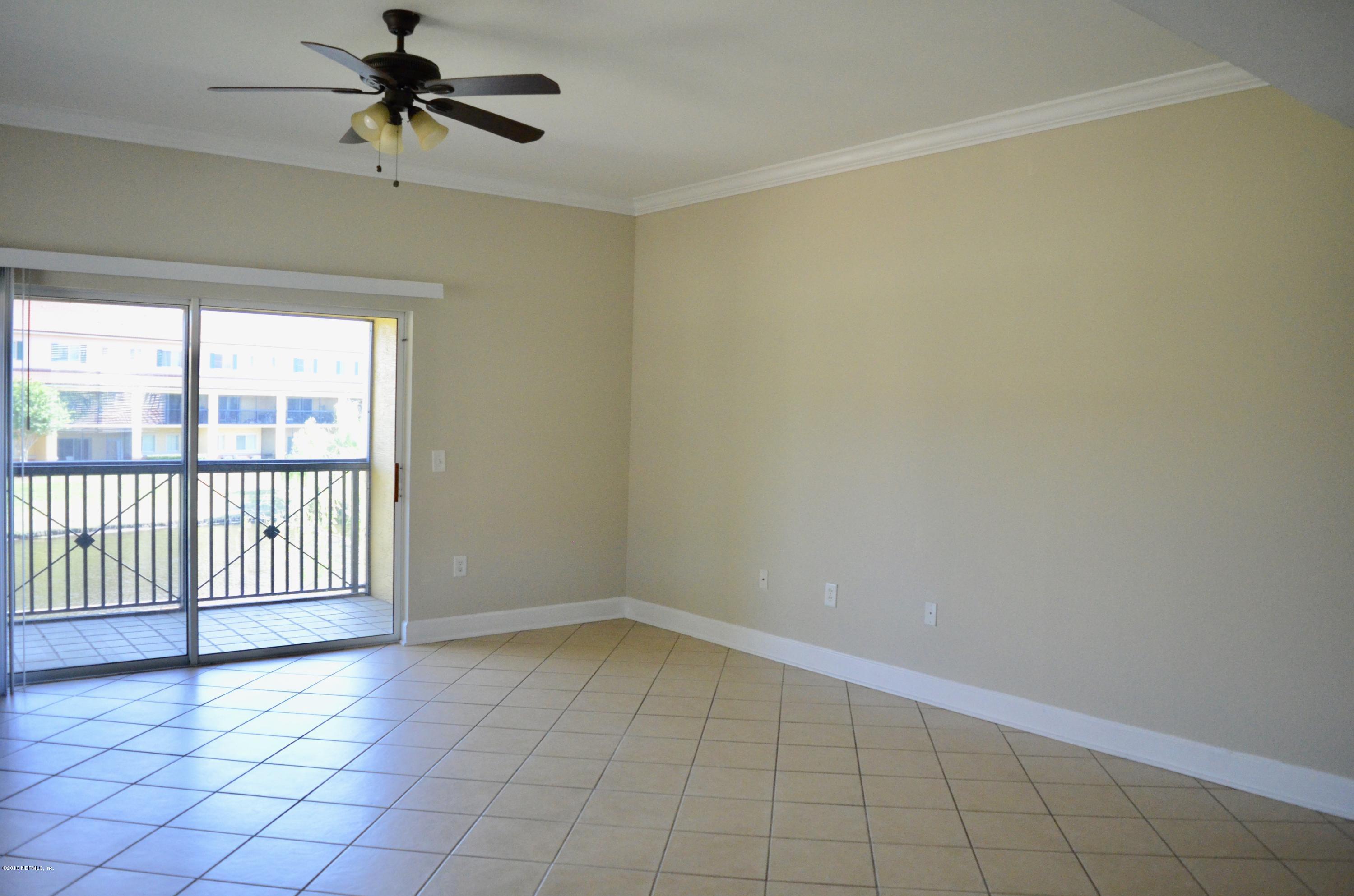 9745 Touchton Road, Unit 1821 Jacksonville, FL 32246 - Photo 10 of 33 a view of an empty room with a window