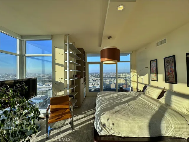 a reading room with furniture and a window