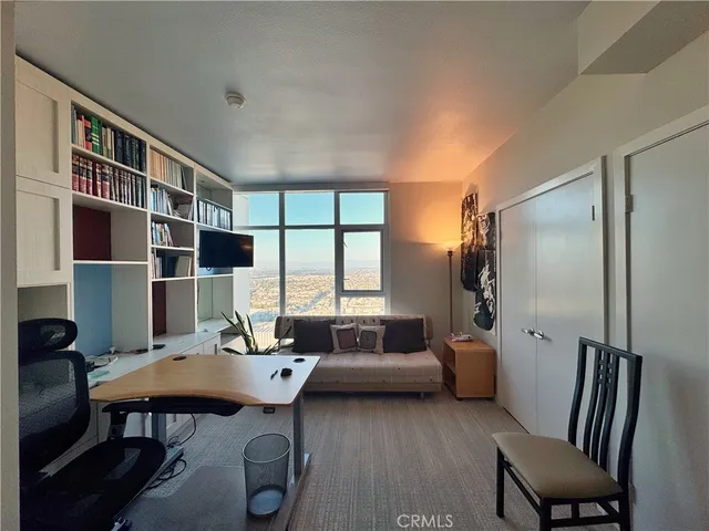 a workspace with furniture and window