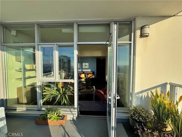 a view of a balcony with city