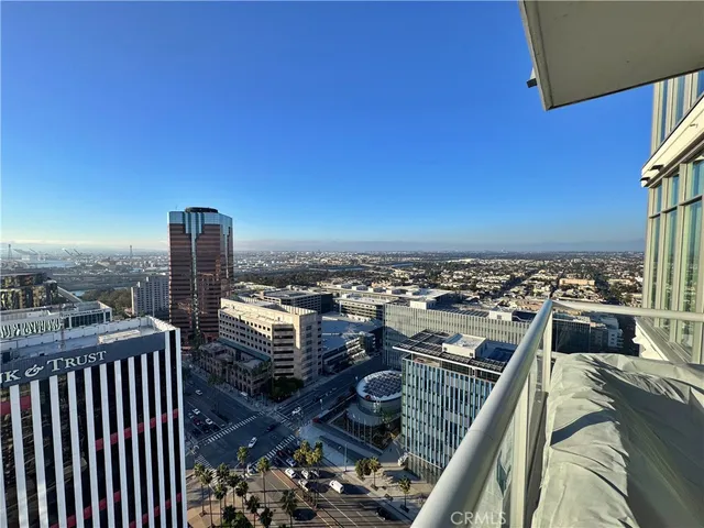 a view of city with ocean