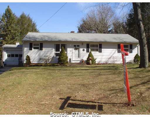 67 Fans Rock Road Hamden, CT 06518 - Photo 1 of 1 a front view of a house with garden