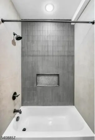 a bathroom with a bathtub