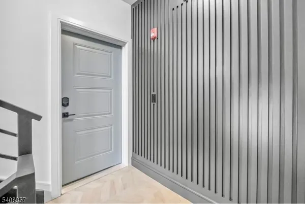 a view of a livingroom with a wooden door